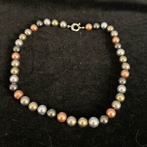 Multi colored faux pearl necklace with decorative clasp EUC